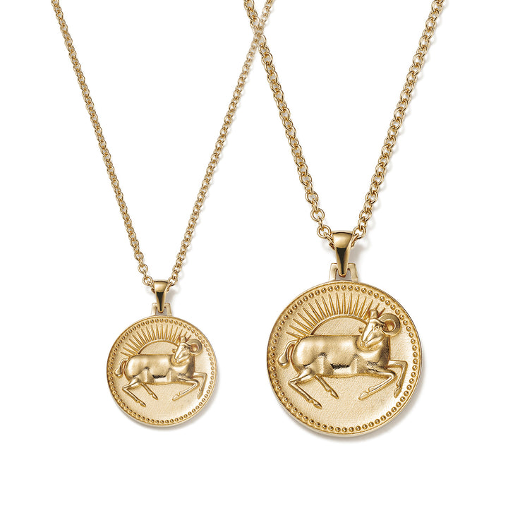 Small and Large Ethical Gold Aries Pendant Necklaces Side By Side on a White Background