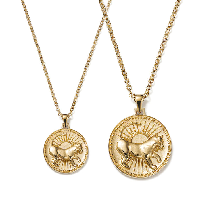 Small and Large Ethical Gold Leo Pendant Necklaces Side By Side on a White Background