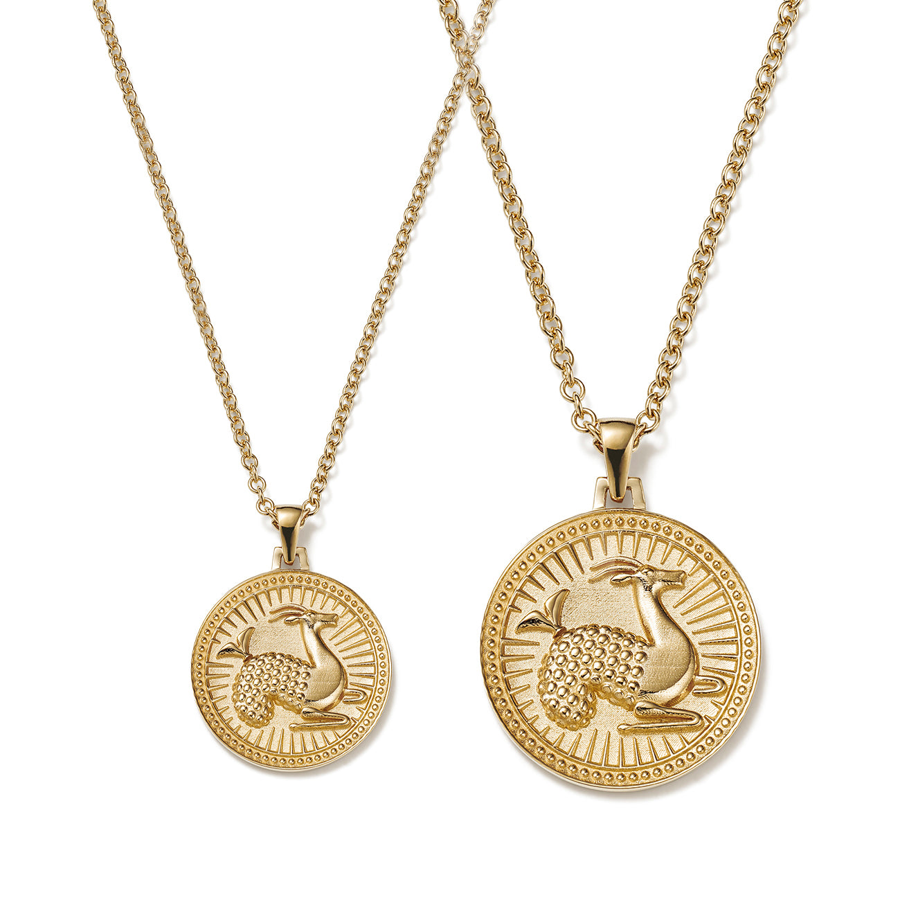 Small and Large Ethical Gold Capricorn Pendant Necklaces Side By Side on a White Background
