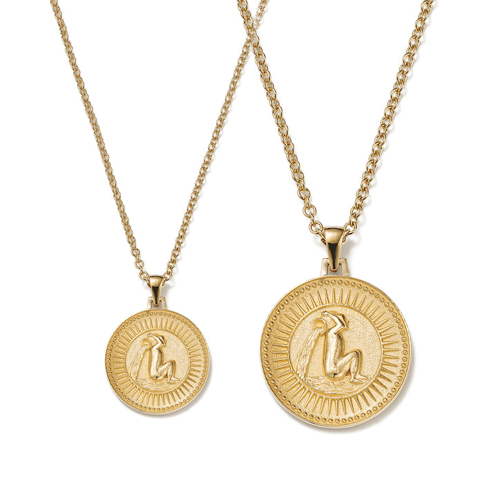 Small and Large Ethical Gold Aquarius Pendant Necklaces Side By Side on a White Background